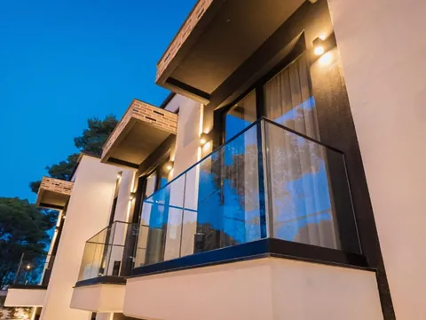 Façade of Hotel Beke in Vlora, with glass balconies